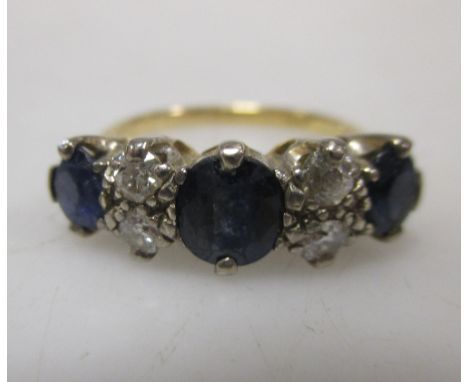 An 18ct gold sapphire and diamond ring  