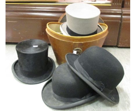 A box of sundries including two bowler hats, a top hat, an Ashworth's ceramic teapot stand etc  