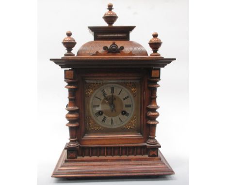 A late 19th century oak cased mantle clock with brass dial, 45cm high  