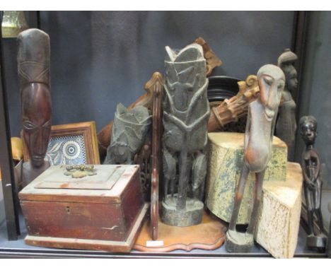 A carved walnut wall bracket, various African carvings, etc  