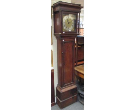 Peacock (Kimbolton) - an oak 30 hour longcase clock with brass dial  