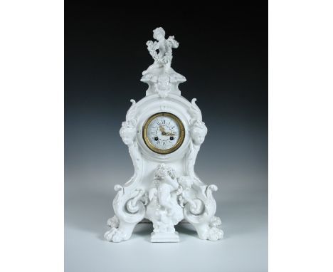 A 19th century blanc de chine mantel clock, the shaped moulded case with enamel dial painted with floral swags, unsigned bell