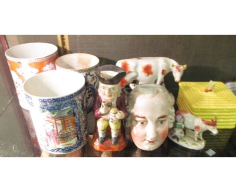 A small collection of ceramics including three Chinese mugs, a/f, A ceramic inkwell modelled as the head of George IV, a toby