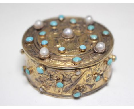 A small silver gilt, enamel and gemset box, imported by M&L, London 1961, 40mm; an Austrian silver gilt gem set box, 42mm dia