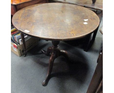 A George III oak tripod table  