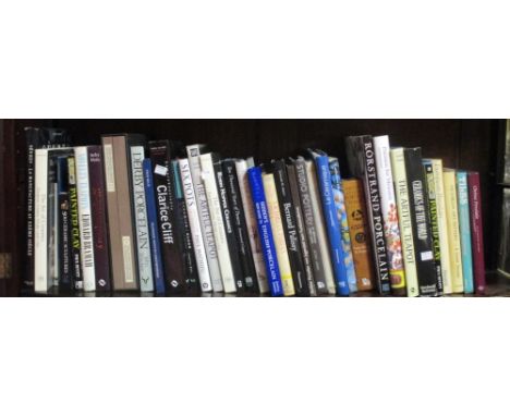 Ceramics, a collection of art and design reference books, a shelf  