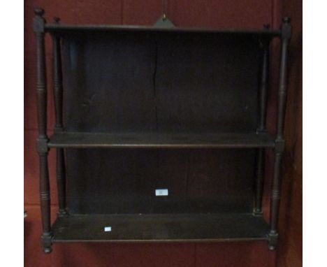 A small Regency mahogany wall shelf  