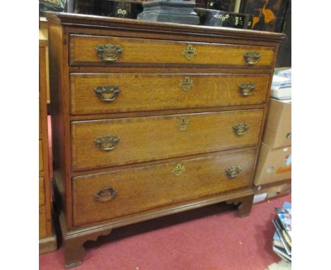 A George III oak crossbanded chest of drawers, four long drawers, on bracket feet, 99cm wide  