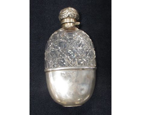 A silver mounted cut glass brandy flask  