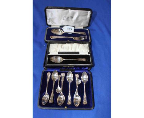 Cased silver teaspoons, christening spoon and fork, spoon, and pair salt spoons.