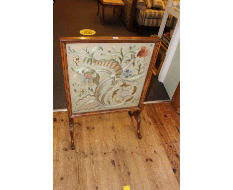 Walnut framed glazed needlework panel firescreen, 87cm by 62.5cm.