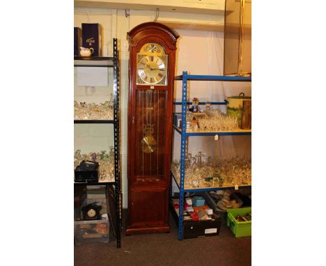 Modern triple weight longcase clock.