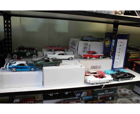 Shelf collection of the Franklin and Danbury Mint Diecast toy cars including Simply Miles Ahead, Dodge, Ford Skyliner, Cadill