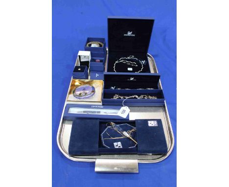 Collection of boxed Swarovski jewellery including necklace and bracelets, and pen and compact.
