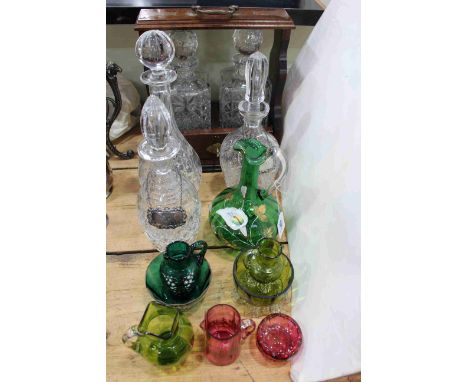 Victorian ruby and green glass crystal decanters with labels and two bottle tantalus.