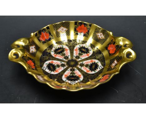 A Royal Crown Derby 1128 Imari twin handle trinket bowl, printed marks, seconds