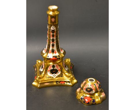 A Royal Crown Derby 1128 solid gold band Imari candlestick, globular sconce, square base with each corner as a stylised dolph