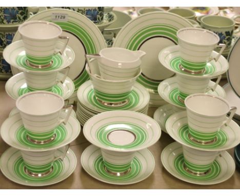 A 1930s Anchor china tea service including  cups, 12 saucers, 12 side plates, 2 bread plates, milk jug and sugar bowl, etc pr