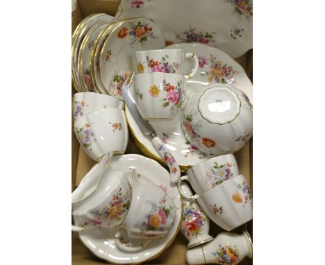 A Royal Crown Derby Posie pattern tea service for six, including eight dessert plates, bread & butterplate, milk & sugar, etc