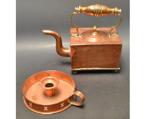 An Arts and Crafts copper chamber stick;  an Arts and Crafts copper kettle, impressed V. R (2) 