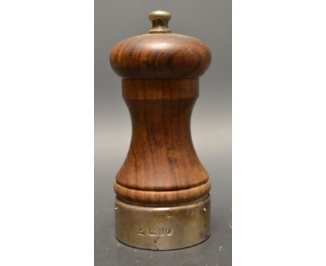 A silver mounted wooden pepper grinder