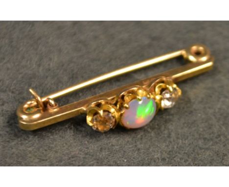A diamond and opal bar brooch, 9ct gold mount