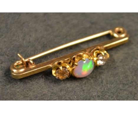 A diamond and opal bar brooch, 9ct gold mount