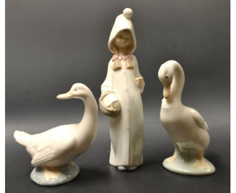 A Lladro figure of a hooded girl;  a Nao goose;  another, similar (3) 