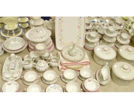 A Johnson Brothers floral dinner service, comprising service dishes, cups and saucers, dinner, side and dessert plates, oatme