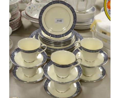 A Minton Mandeville six setting dinner and tea service, including cups, saucers, dinner and side plates etc, printed marks