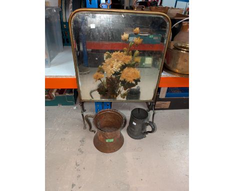 An Arts and Crafts copper 'mug' with embossed decoration, height 17cm, a brass painted mirror fire screen and a large pewter 