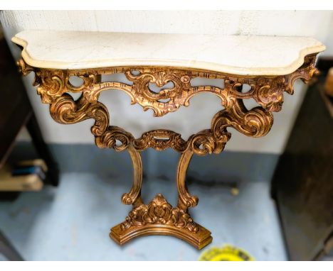 A gilt Rococo style console table with marble top.