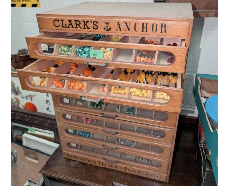 A vintage Clark's Anchor shops embroidery thread chest with some original thread.44 x 36 x 59.5cm high