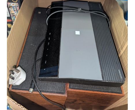 Bang and Olufsen; a vintage Beomaster 900 receiver/amplifier, together with a matching pair of Beovox 1000 speakers and a Beo