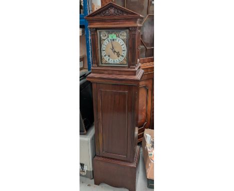 An early 20th century mahogany cased mantel clock and pedestal stand with opening door.