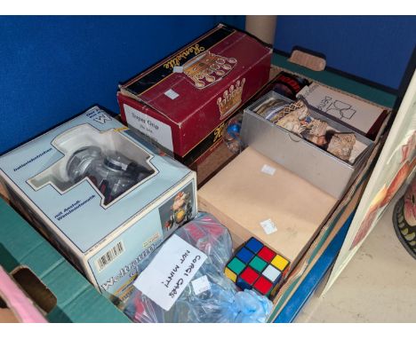 A selection of toys and collectors items including a boxed robot, diecast cars, a pair of crown green bowls, vintage Christma