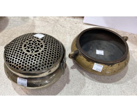 A Chinese bronze censor with double handles wear to the gilt with impressed mark to the base, diameter 15cm and another Chine