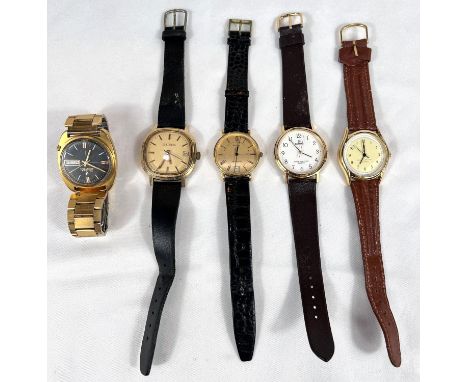 A vintage Bulova Accutron and other watches.
