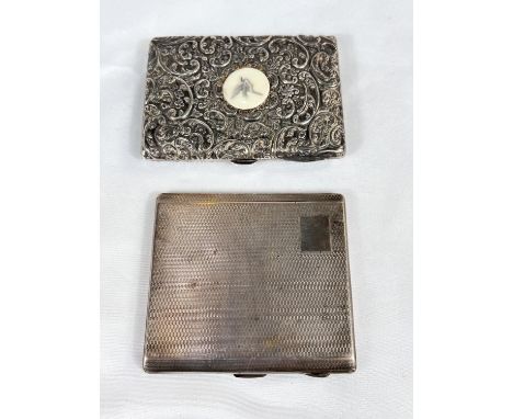 An Art Deco hallmarked silver engine turned cigarette case and a silver embossed lady's card case with pencil, gross 7.8oz.