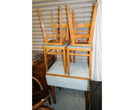 A vintage Formica top drop leaf kitchen table, two chairs, two stools, a tea trolley, an oak Jacobean style drop leaf tea tro
