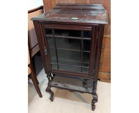 A mahogany glass fronted music cabinet and a mahogany commode.