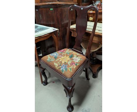 A George II period mahogany chair with knurled legs and tapestry seat