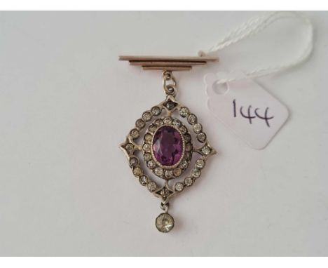 A silver and paste pendant on a bar 