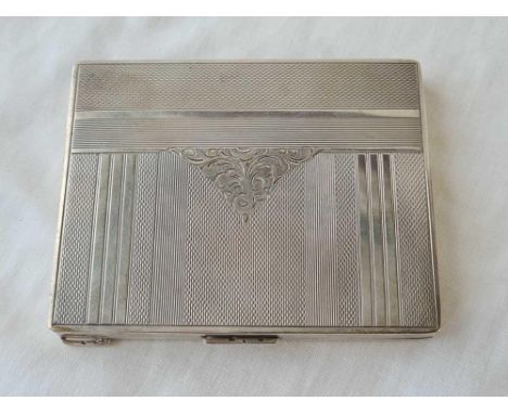 A cigarette case with engine turned decoration, unmarked, w.120g