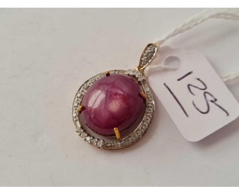 A star ruby and diamond pendant 9ct - 4.9 gms 