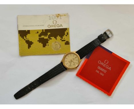 A gents Omega Deville Quartz wrist watch with seconds sweep and date aperture, complete with paperwork 