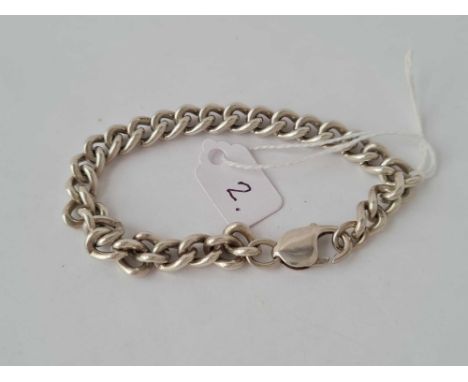 A silver curb link bracelet - 29.5 gms 