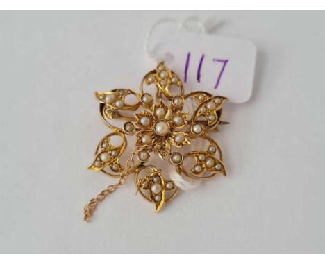 A PRETTY SEED PEARL STAR BURST BROOCH/PENDANT WITH SWIVEL  9CT - 5 GMS 