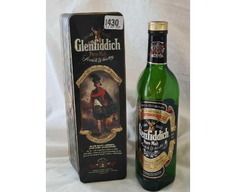 Bottle of Glenfiddich Scotch Whisky in metal case