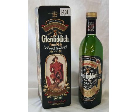 Bottle of Glenfiddich Scotch Whisky in metal case